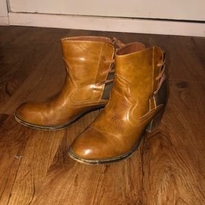 Brown faux leather booties.